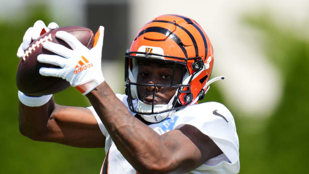 July 31, 2023; Cincinnati, OH, USA; Cincinnati Bengals wide receiver Stanley Morgan (17) competes a catch during NFL training camp practice, Monday, July 31, 2023, in Cincinnati. Mandatory Credit: Kareem Elgazzar-USA TODAY Sports  